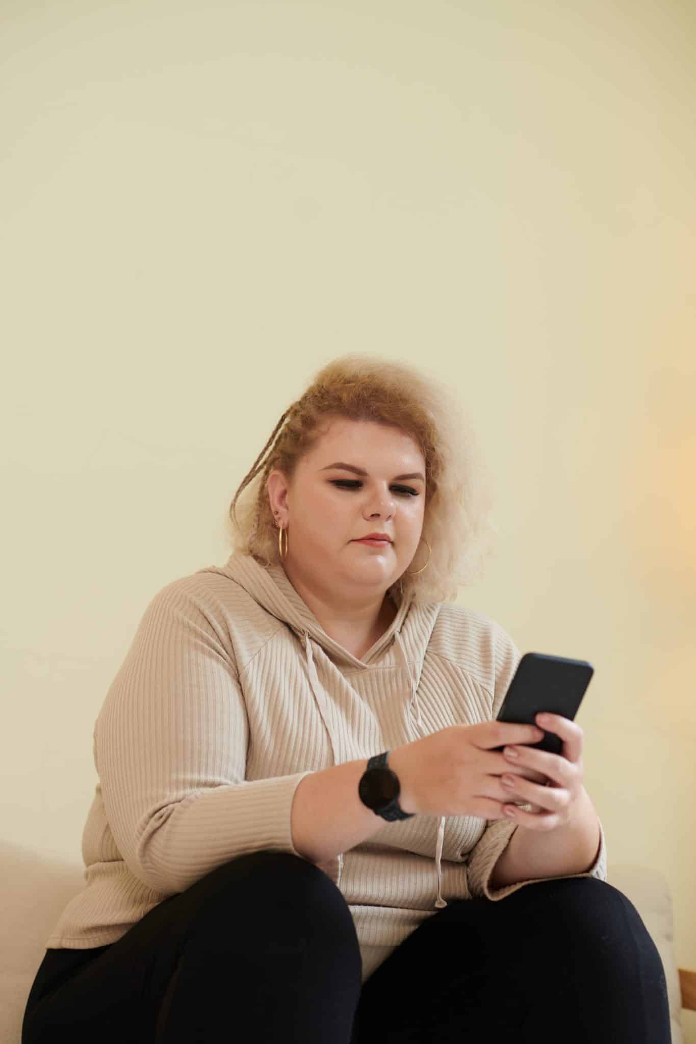 woman reading text messages