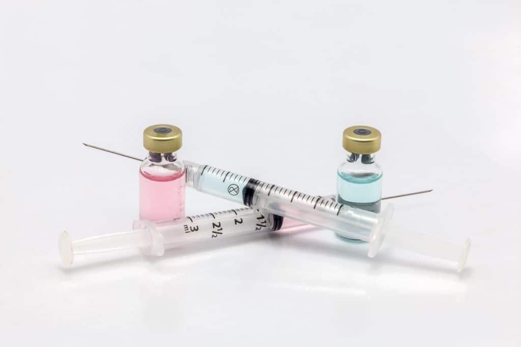 2 needles and vials