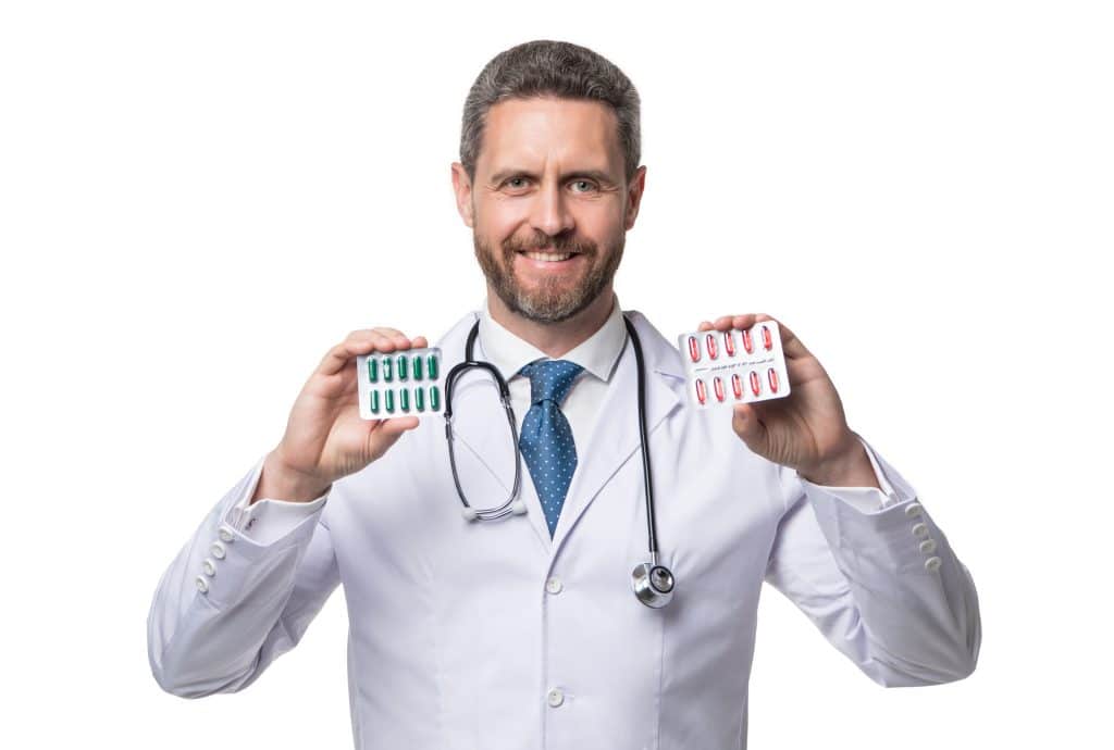 doctor holding medication