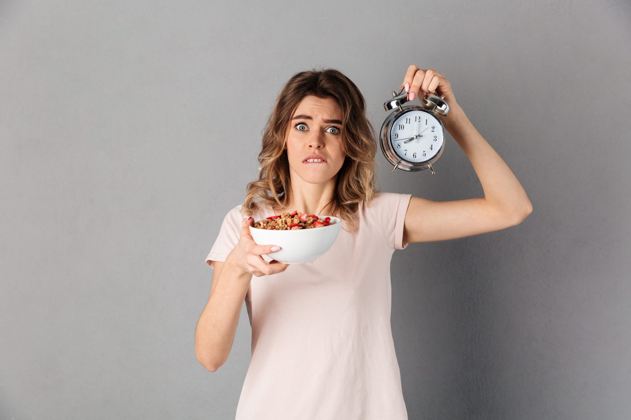 woman with food and clock